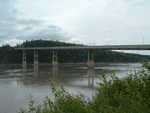 The only bridge over the Yukon River, a very long and wide river.  The bridge carries the oil pipeline over the river, too.