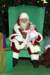 Visiting Santa in San Antonio December 2008.  She hasn't a clue!