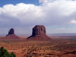 Right Mitten and Merrick Butte with rain clouds moving across the Valley