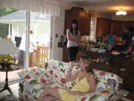 Gathering before dinner, Justin and Bob grilling chicken on the deck, Leigh, Carrie, Mike and Janet