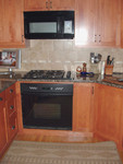 The cooking appliances are all from Dacor, I'm very pleased with them.  The oven is Dacor Preference PCS 130, the cooktop is the Dacor Preference SGM 304.