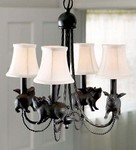 My new kitchen chandelier.  Flying pigs.  Much more amusing than my old one.  I got it from Plow and Hearth.