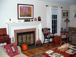Living room.  The floor was stripped and refinished.  My daughter and I painted and I bought furniture.