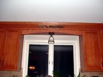 Trim over the sink.  The sign from my parents cottage just fits up there.