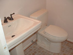 New sink and toilet are in.  Toto Drake ADA in Sedona Beige.  I really like the softer color.  What a wonderful change.  It's such a small room, it's hard to get a good picture.