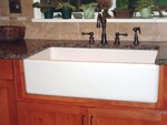 Shaw's Original 36" fireclay farm sink.  Faucet is Concinnity Strathmore in oil rubbed bronze.