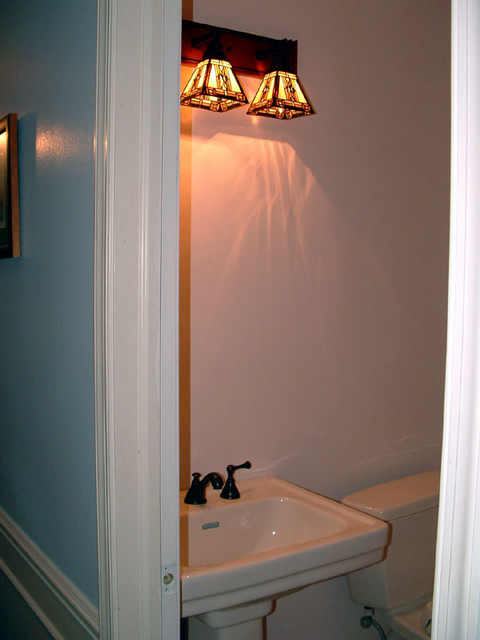 Sink and part of light over the sink.