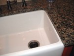 Top of sink.  Slight reveal, which works well.