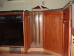 Tray cabinet, the dividers slide out, though I'm not sure why.